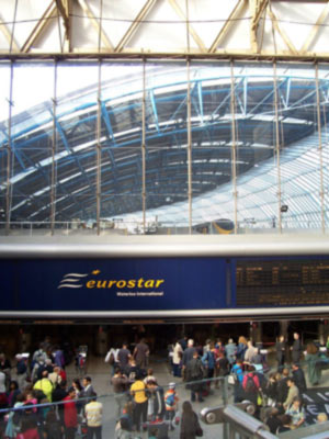 Waterloo International Train Station, with passengers and a Eurostar train visible